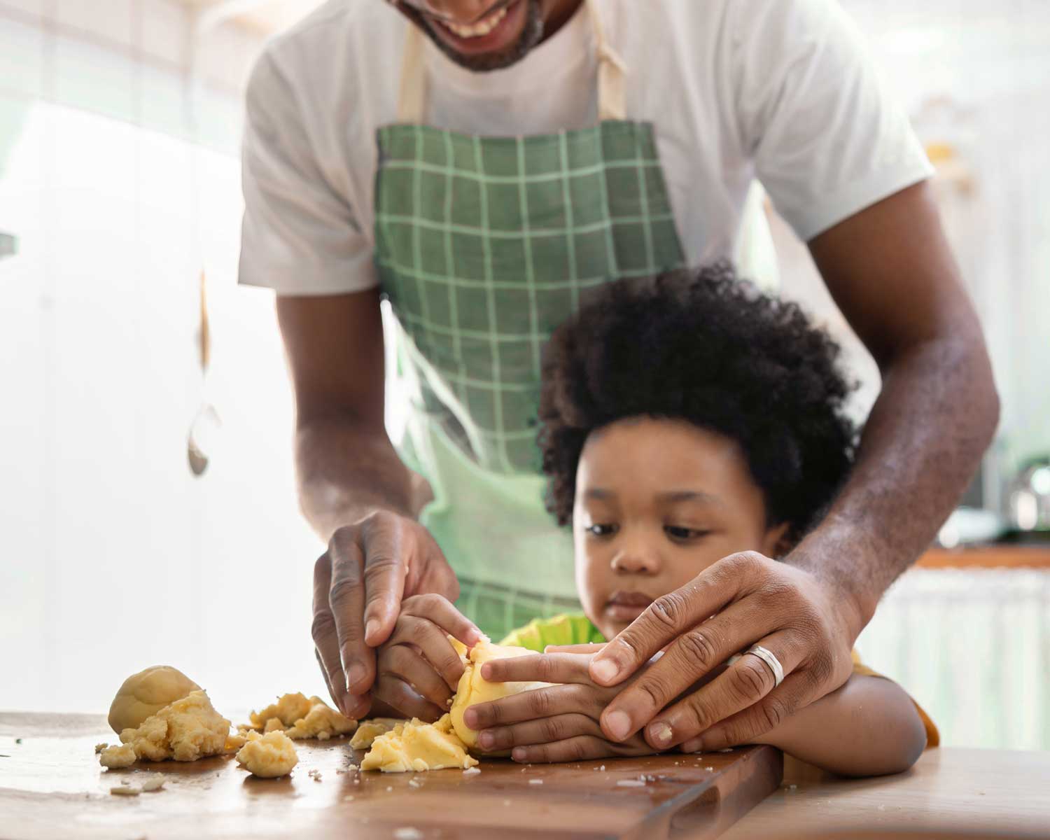 Father baking with child