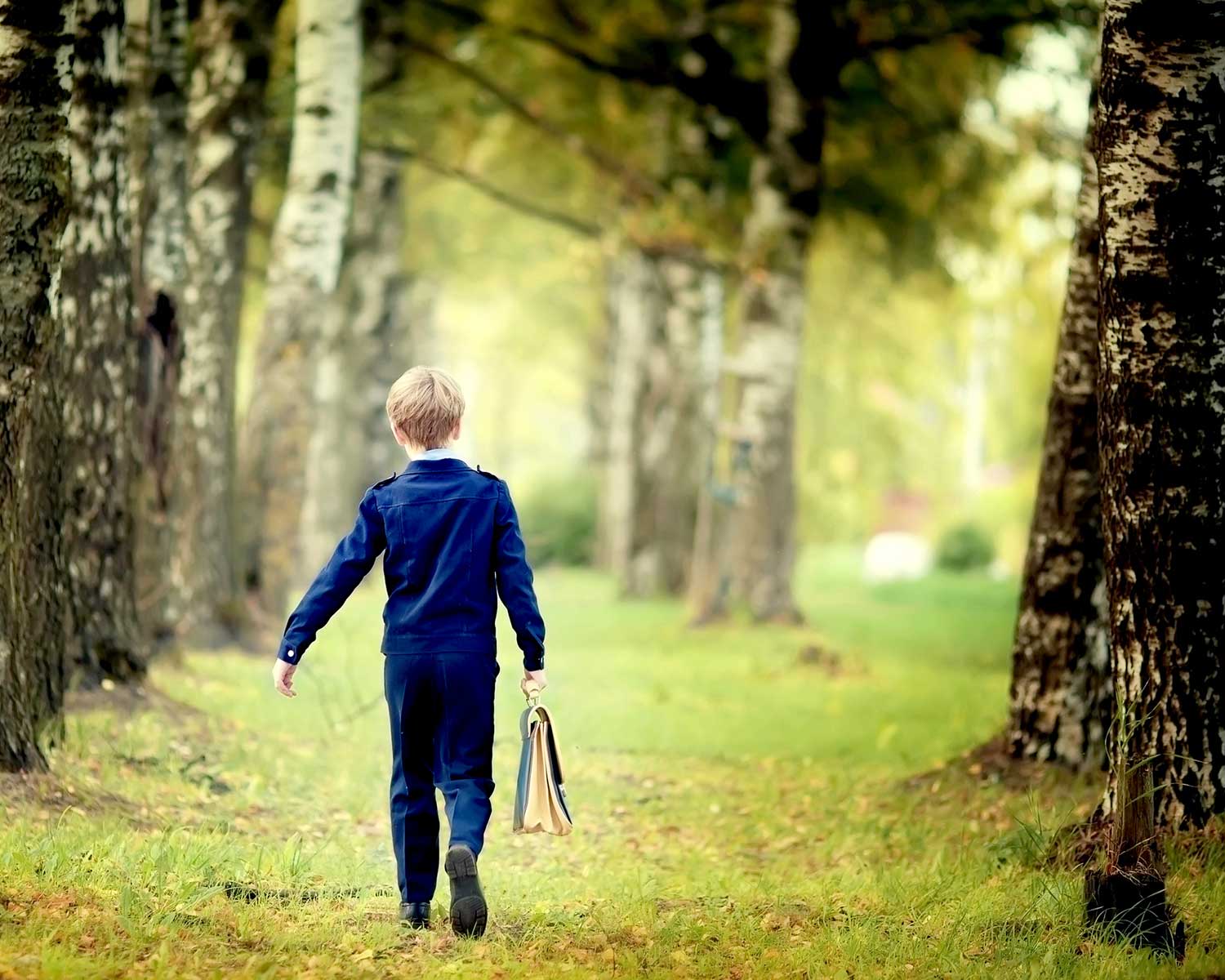 Kid carrying briefcase